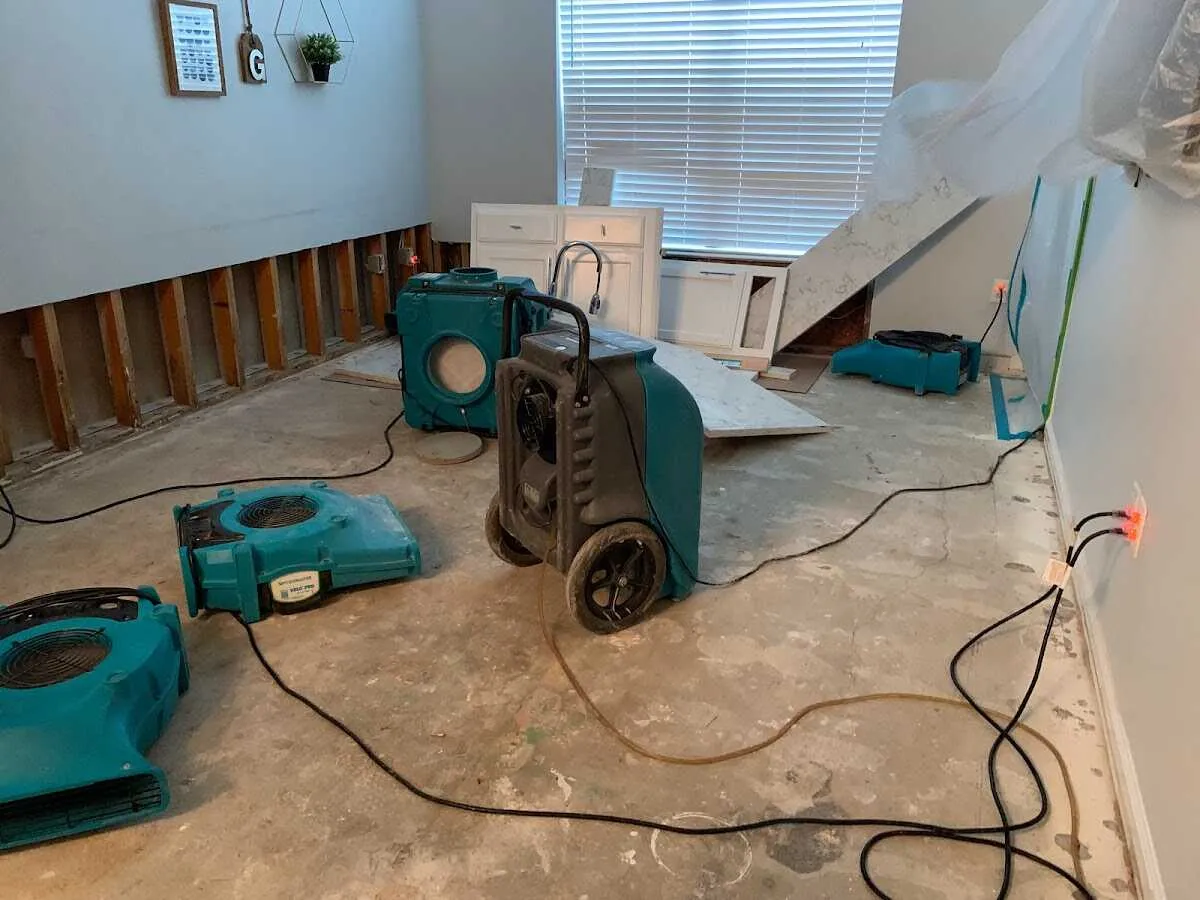 Dehumidifier in flood-cut room for Water Damage Restoration in Delavan